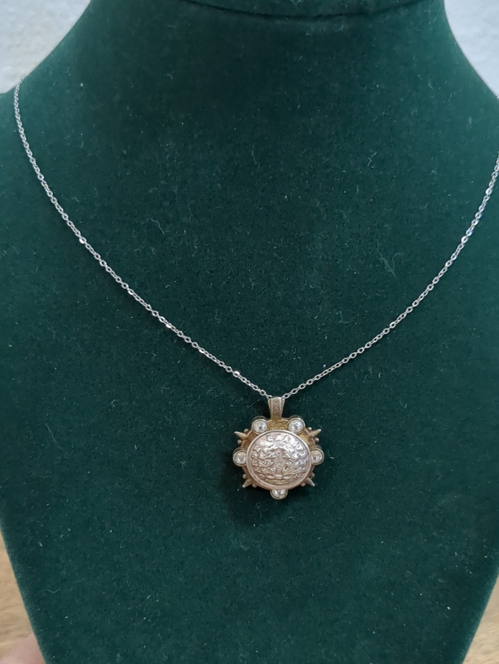 FRENCH KANDE Vintage-Inspired Silver Sunburst Pendant Necklace